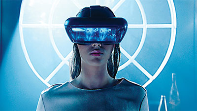 Women with augmented reality goggles on