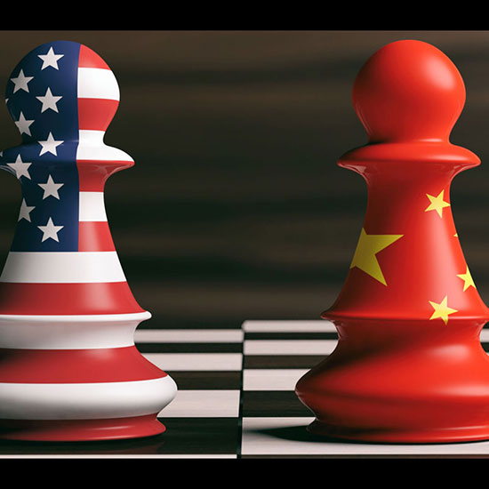 Chess game pieces individually colored in U.S. and China flag