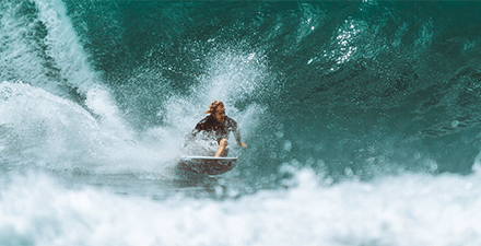 Surfer surfing a wave
